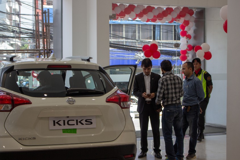 People observing vehicle in the exchange offer