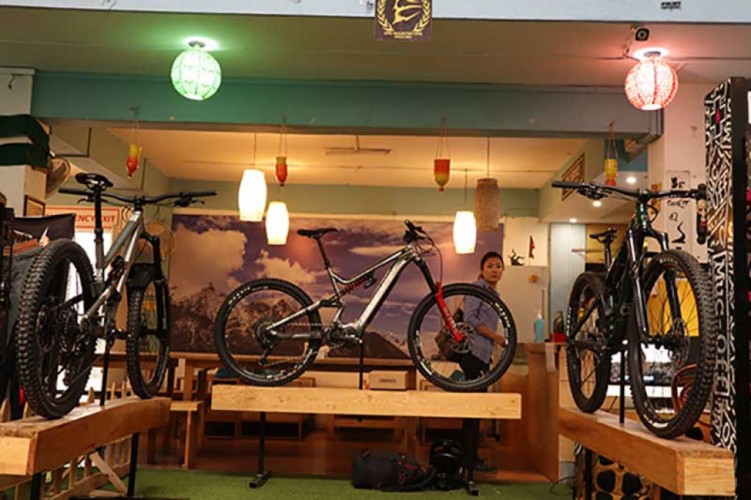 Visitors checking the bicycles kept on exhibition during the Cycle Expo event held in Thamel, Kathmandu